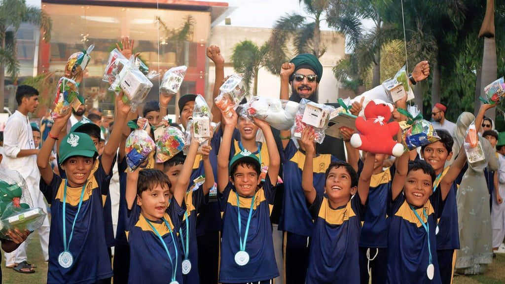 Lahore, Pakistan - Participating in Orphan Support & Mawlid Support Programs by Celebrating Grand Mawlid an Nabi ﷺ, Serving Hot Meals with Blessed Birthday Cake, Having Fun Activities & Distributing Gifts to Beloved Orphans & Less Privileged Families