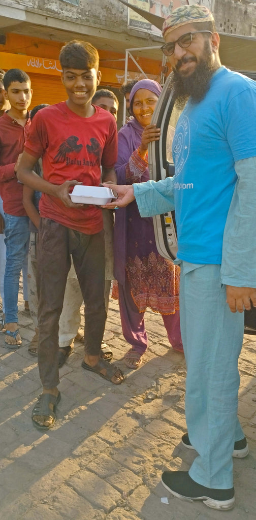 Lahore, Pakistan - Participating in Mobile Food Rescue Program by Preparing, Packaging & Distributing Hot Homemade Meals to 40+ Less Privileged Children & Women