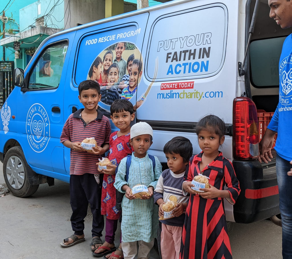 Hyderabad, India - Participating in Mobile Food Rescue Program by Distributing Hot Meals to Local Community's Disabled, Less Privileged & Homeless Families