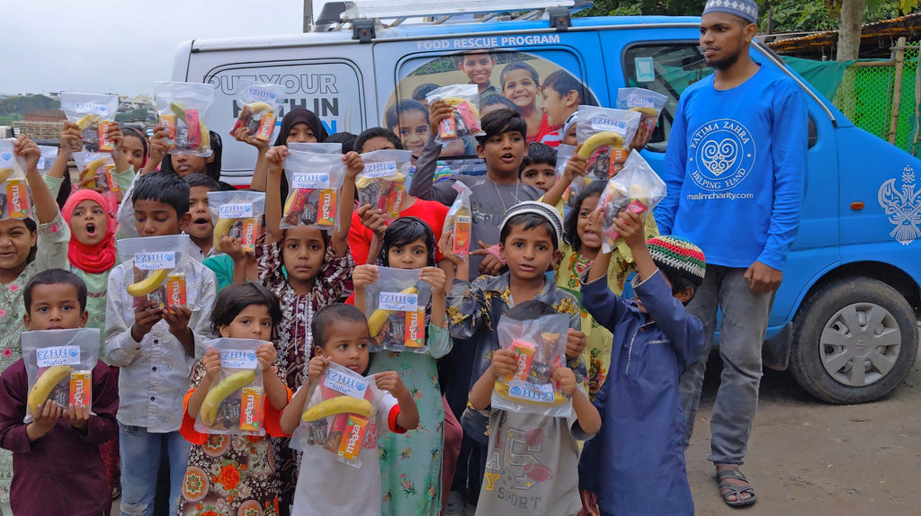 Hyderabad, India - Participating in Mobile Food Rescue Program by Distributing 160+ Snack Packs with Fruits, Juice, Cookies & Chocolates to Madrasa Students, Homeless & Less Privileged Families