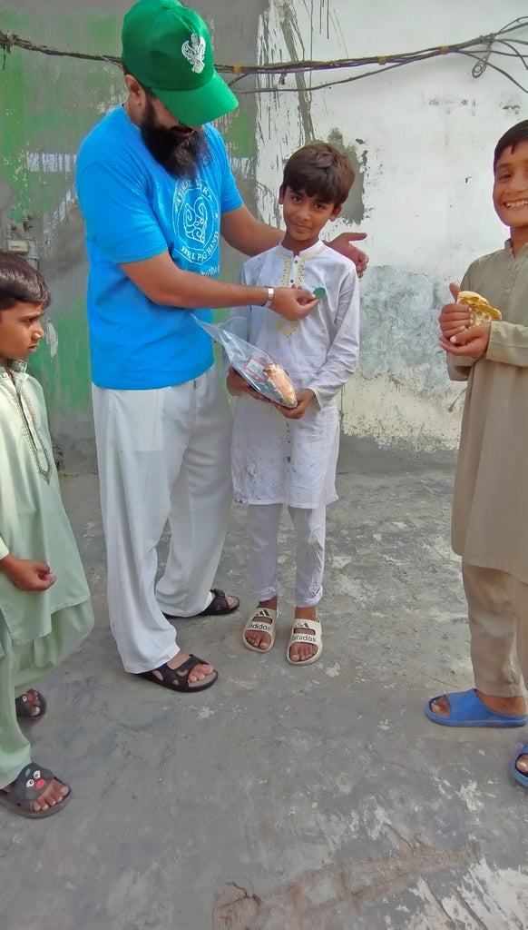 Lahore, Pakistan - Participating in Mobile Food Rescue Program by Preparing, Packaging & Distributing Gifts & Goodie Bags to Less Privileged Children