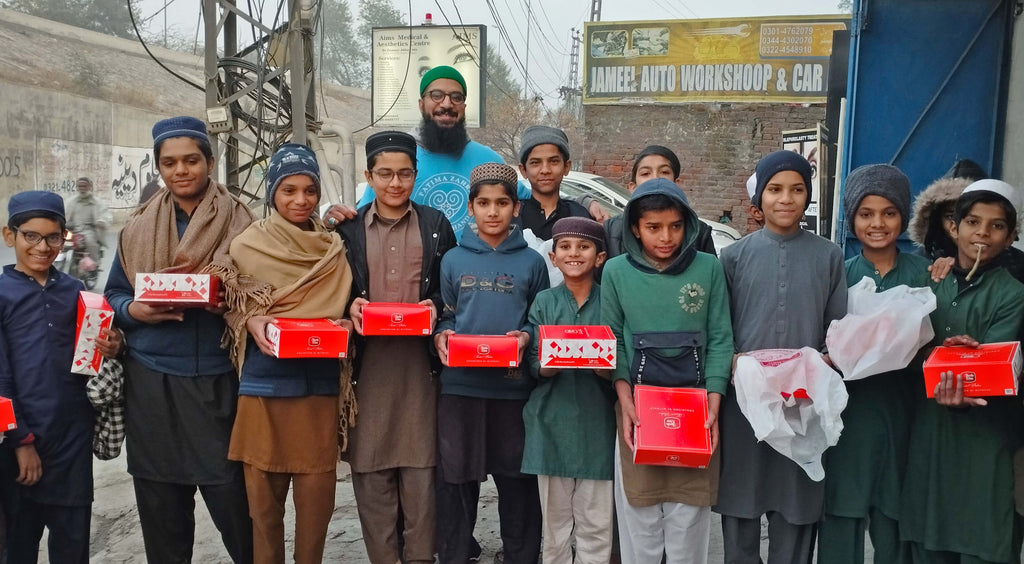 Lahore, Pakistan - Participating in Mobile Food Rescue Program by Preparing, Packaging & Distributing Hot Lunches with Snacks, Chocolates & Juice to 40+ Less Privileged Children