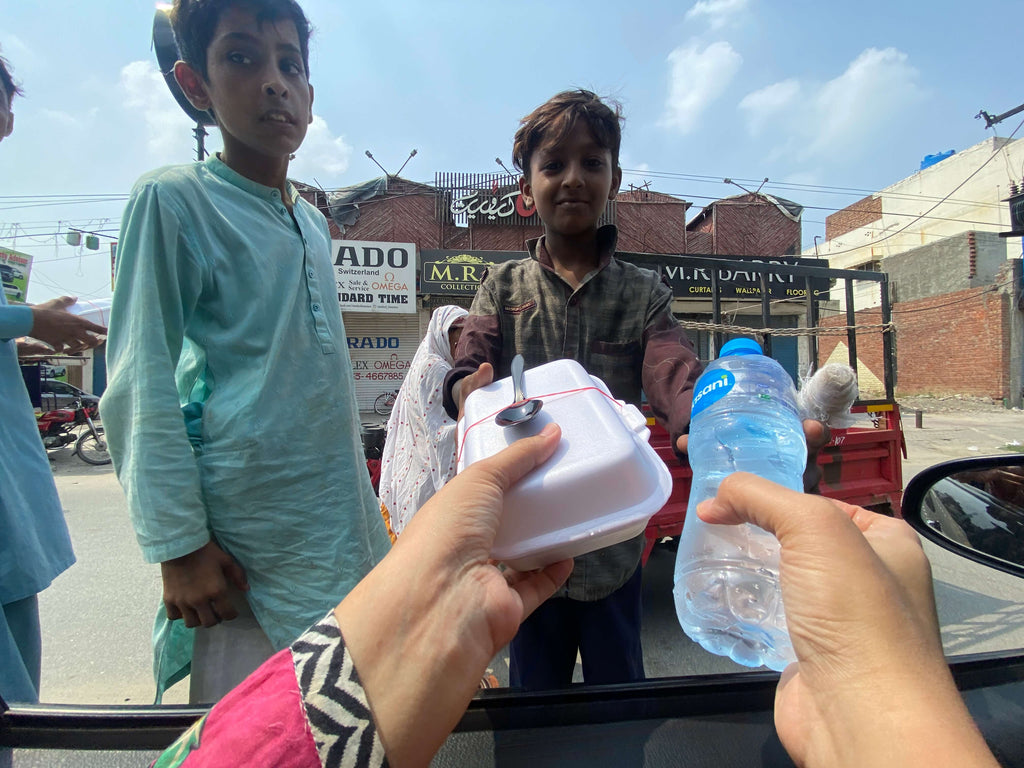 Lahore, Pakistan - Honoring URS/Union of Sayyidina Bilal Al-Habashi ق ع by Distributing 40+ Hot Meals & Cold Water Bottles to Local Community's Homeless & Less Privileged People