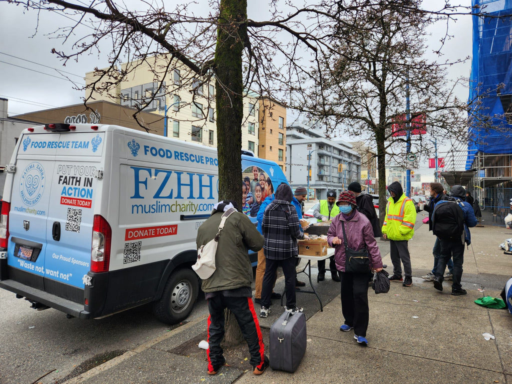 Vancouver, Canada - Participating in Mobile Food Rescue Program by Serving Hot Breakfast with Coffee & Water to Homeless & Less Privileged People