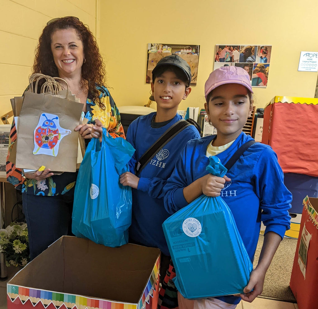 Orlando, Florida - Honoring the Holy Shahadat (Witnessing) of Amer l-Mumineen Sayyidina Umar al-Farouq ع & Holy Wiladat (Birthday) of Mawlana Khas Muhammad Shirwani ق ع by Distributing Essential School Supplies to Community's Local Food Pantry