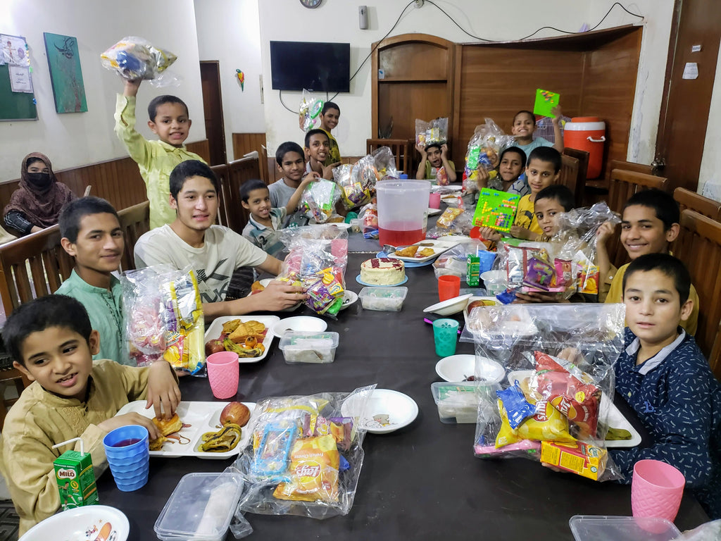 Honoring Lailat ul Qadr by Serving Iftar Meals and Blessed Cake & Distributing Goodie Bags to Beloved Orphans - PK