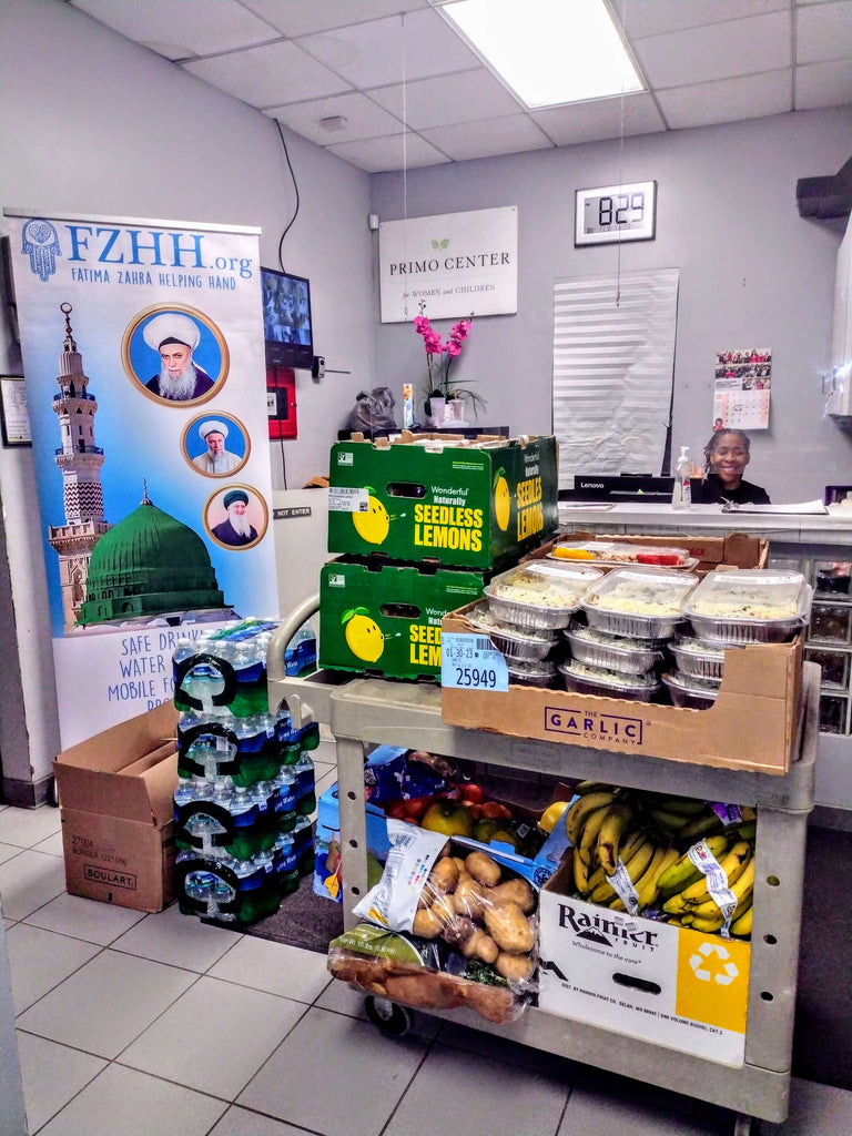 Chicago, Illinois - Participating in Mobile Food Rescue Program by Rescuing & Distributing Take Home Dinner Meals, Fresh Fruits & Water Bottles to Local Community's Homeless Shelter