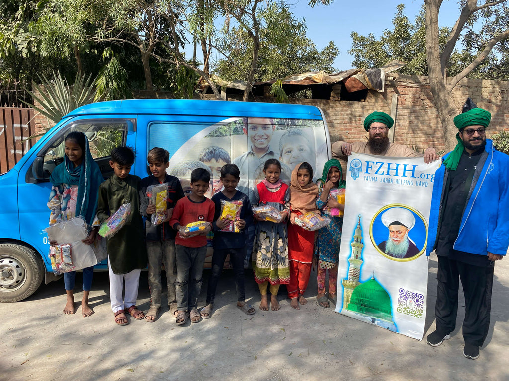 Lahore, Pakistan - Participating in Mobile Food Rescue Program by Distributing Goodie Bags & Meal Packs to Local Community's Less Privileged Children