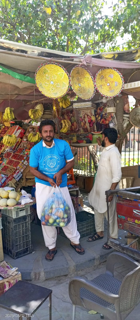 Karachi, Pakistan - Participating in Mobile Food Rescue Program by Distributing Fresh Fruit Packages to Less Privileged Children & Homeless Families