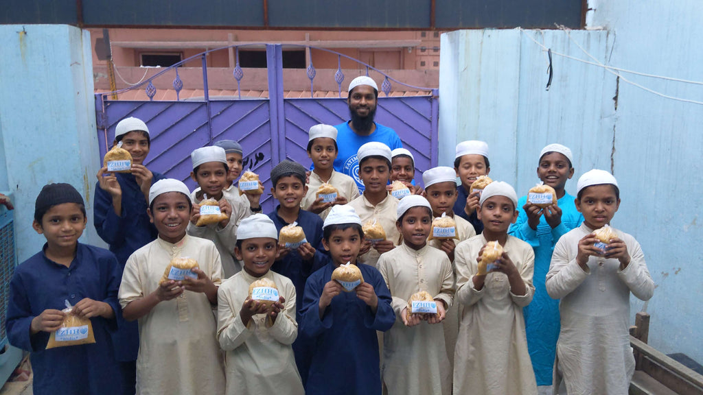 Hyderabad, India - Participating in Mobile Food Rescue Program by Distributing Hot Meals to Local Community's Madrasa/School Children, Homeless Families & Less Privileged People