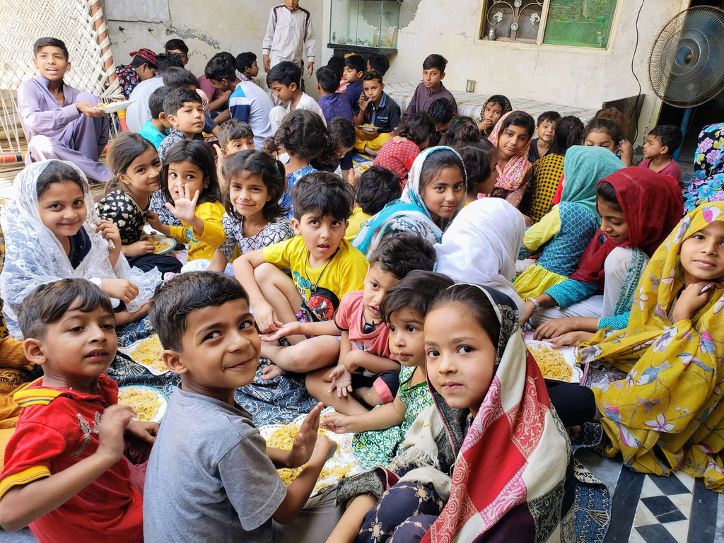 Lahore, Pakistan - Participating in Orphan Support Program & Mobile Food Rescue Program by Serving Hot Meals to Less Privileged Families, Children & Seniors