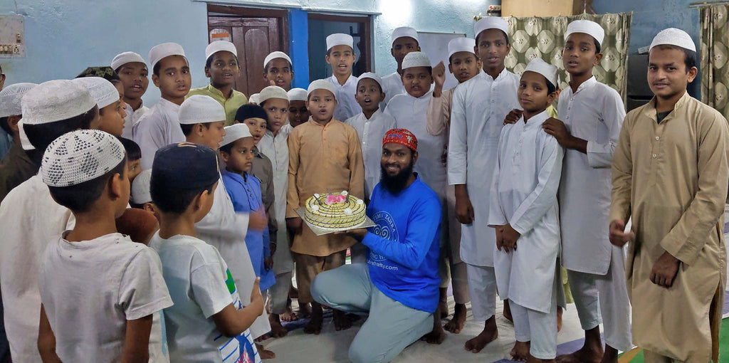 Hyderabad, India - Participating in Mobile Food Rescue Program by Distributing Hot Meals & Blessed Cake to Multiple Madrasas, Homeless & Less Privileged Families