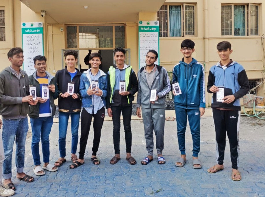 Lahore, Pakistan - Participating in Orphan Support Program & Mobile Food Rescue Program by Distributing Brand New Scientific Calculators to Beloved Orphans & Less Privileged Children