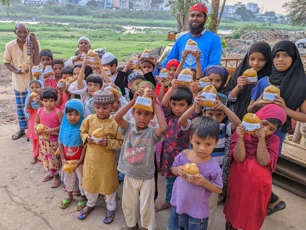 Hyderabad, India - Participating in Mobile Food Rescue Program by Serving & Distributing Hot Meals to Multiple Madrasas, Homeless & Less Privileged Children