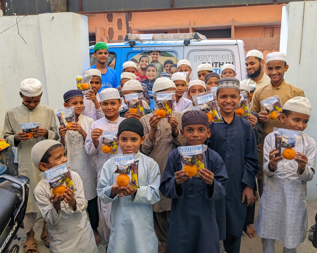 Hyderabad, India - Participating in Mobile Food Rescue Program by Distributing Snack Packs to 200+ Less Privileged Children, Homeless Families & Madrasa Students