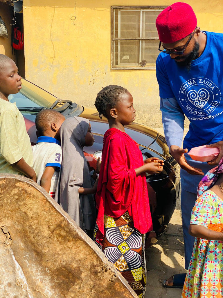 Abuja, Nigeria - Participating in Mobile Food Rescue Program by Distributing Hot Meals & Drinking Water to 100+ Less Privileged Children, Women & Men