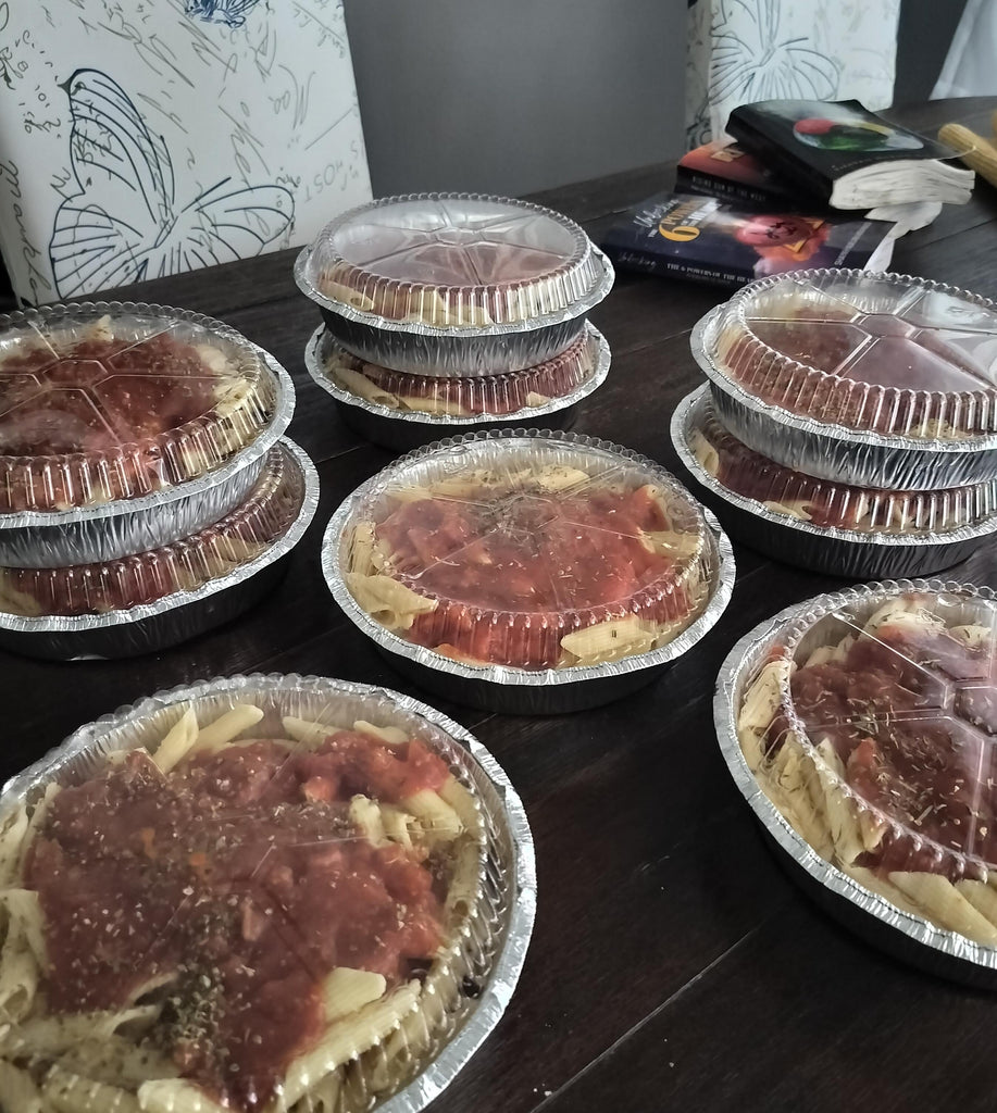 Orlando, Florida - Participating in Mobile Food Rescue Program by Preparing, Packaging & Distributing Homemade Peach Cakes to Local Community's Homeless Resource Center