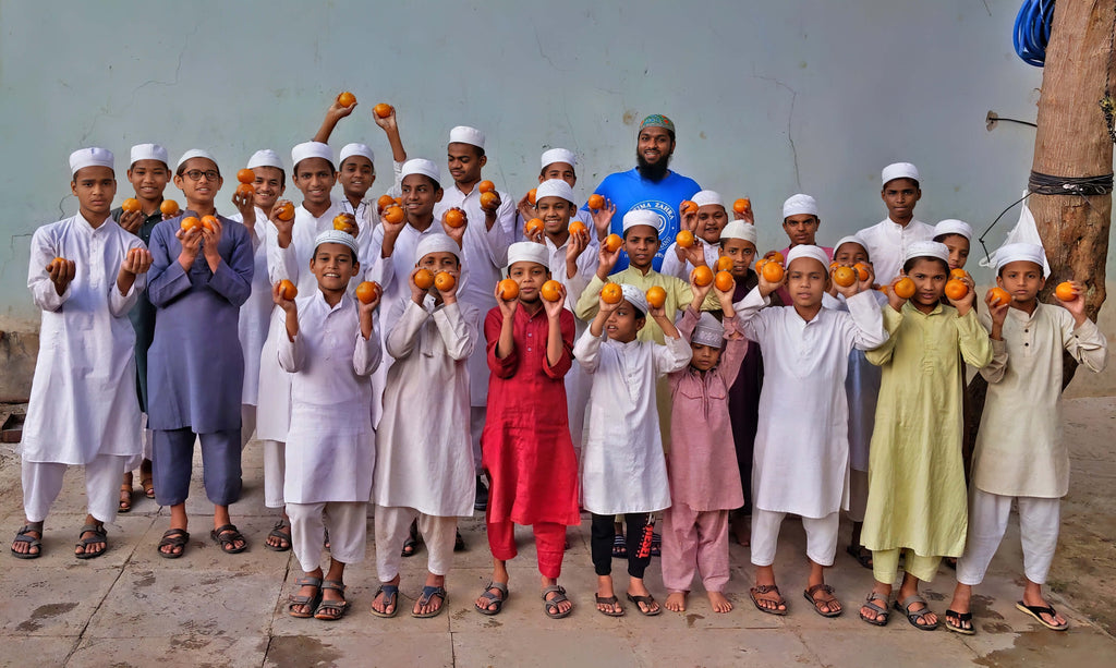 Hyderabad, India - Participating in Mobile Food Rescue Program by Distributing Fresh Fruits to Madrasa Students, Less Privileged Children, Homeless Families & the Elderly