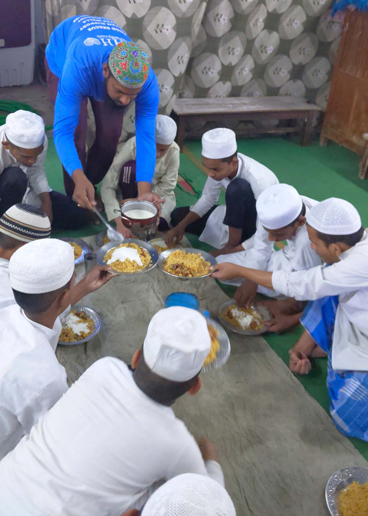 Hyderabad, India - Participating in Mobile Food Rescue Program by Serving Hot Meals to Madrasa Students, Homeless & Less Privileged Families