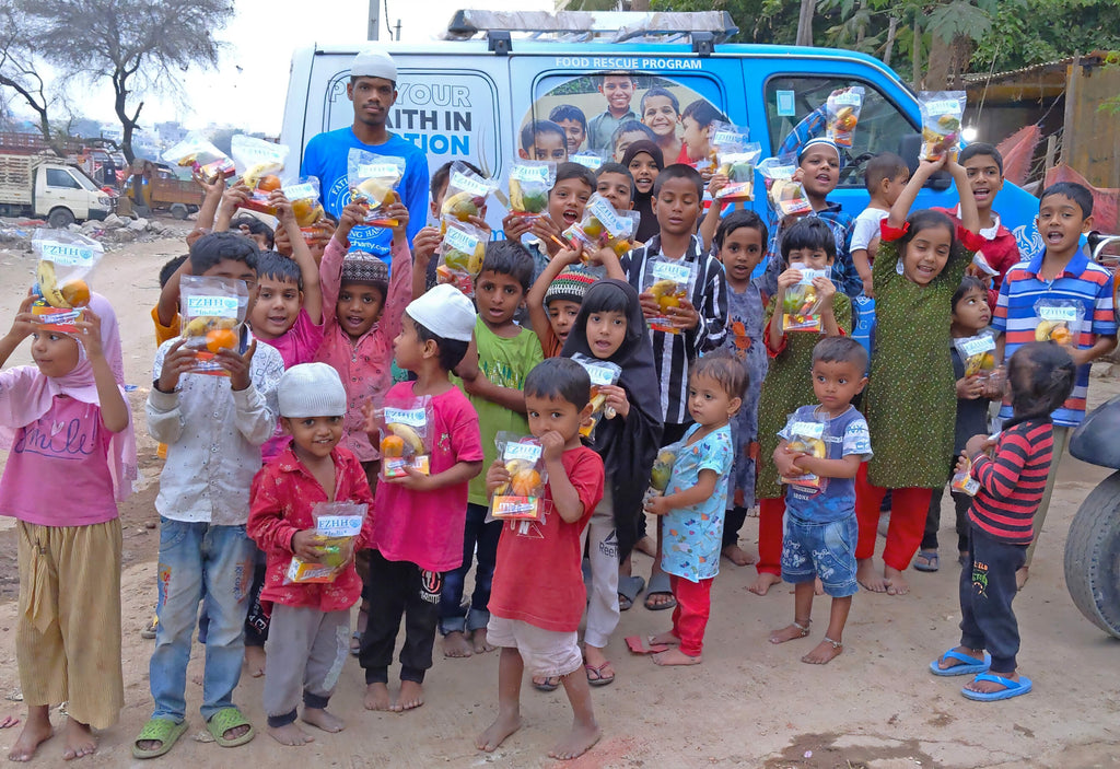 Hyderabad, India - Participating in Mobile Food Rescue Program by Distributing 230+ Iftari Packs with Fruits, Chocolates & Juices to Madrasa Students, Homeless & Less Privileged Children and Families