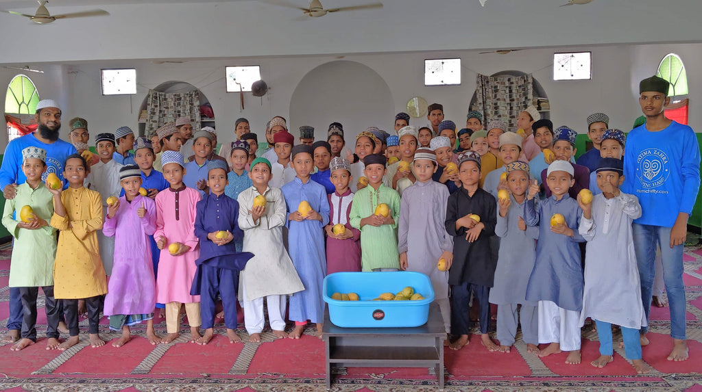 Hyderabad, India - Participating in Mobile Food Rescue Program by Distributing Fresh Mangoes to Madrasa Students, Homeless & Less Privileged Children