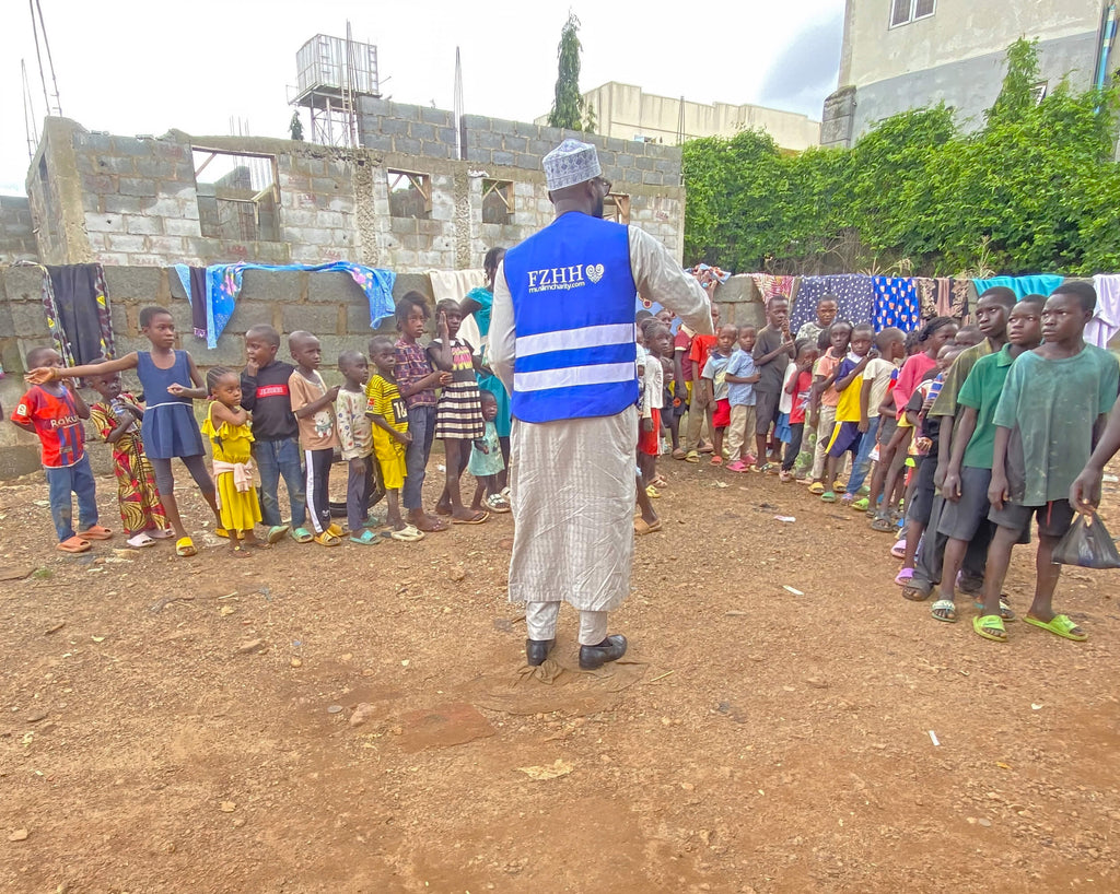 Abuja, Nigeria - Participating in Mobile Food Rescue Program by Distributing Biscuits & Juice Packs to 200+ Less Privileged Children at Internally Displaced Persons Camp