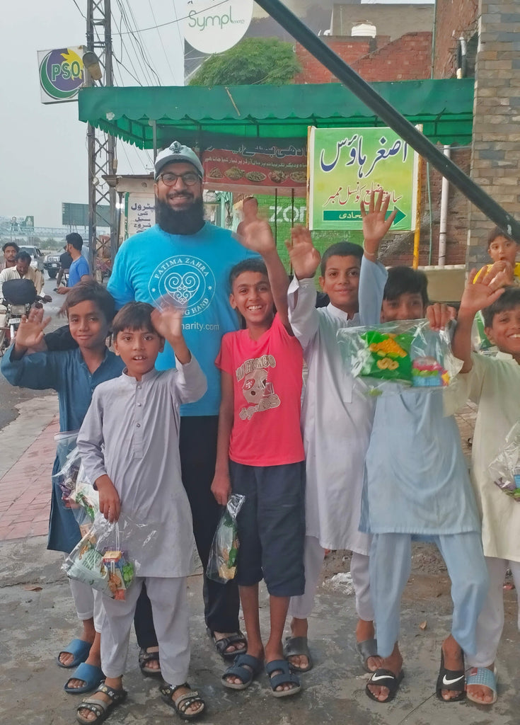 Lahore, Pakistan - Participating in Mobile Food Rescue Program by Distributing 50+ Snack Packs to Less Privileged Children