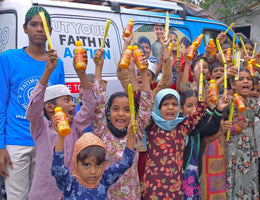 Hyderabad, India - Participating in Mobile Food Rescue Program by Serving Hot Meals to Madrasa Students & Distributing Juices & Candies to 150+ Less Privileged Children