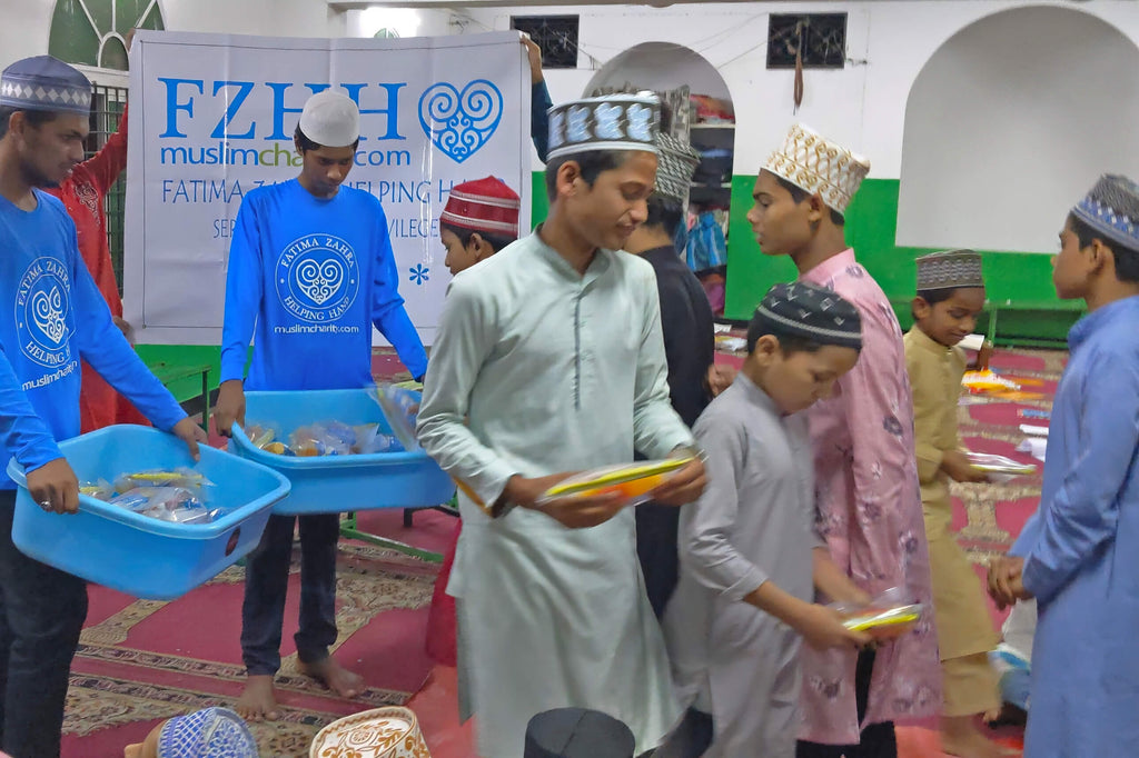 Hyderabad, India - Participating in Mobile Food Rescue Program by Serving Hot Meals & Distributing Snack Packs with Juices, Candies & Cookies to 150+ Less Privileged Madrasa Students