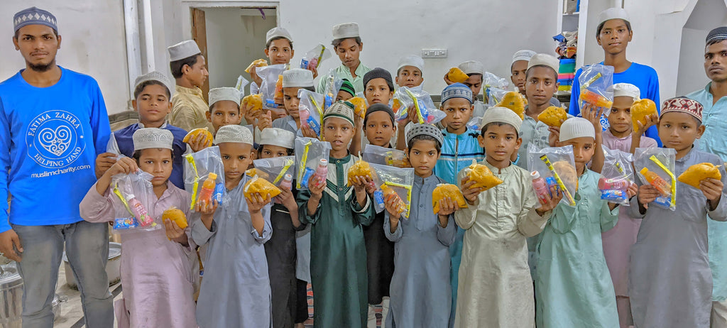 Hyderabad, India - Participating in Mobile Food Rescue Program by Distributing Hot Meals & Snack Packs with Juices, Candies & Cookies to 150+ Less Privileged Madrasa Students & Homeless Families