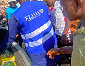 Abuja, Nigeria - Participating in Mobile Food Rescue Program by Distributing Candy & Footwear to Less Privileged Children & Rice Bags to Less Privileged People