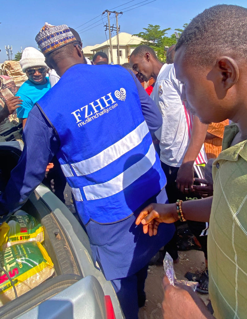 Abuja, Nigeria - Participating in Mobile Food Rescue Program by Distributing Candy & Footwear to Less Privileged Children & Rice Bags to Less Privileged People