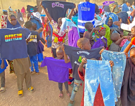 Abuja, Nigeria - Participating in Orphan Support Program & Mobile Food Rescue Program by Distributing Clothes to 200+ Less Privileged Children & Rice Bags to 10+ Less Privileged Adults Living at Disabilities Camp