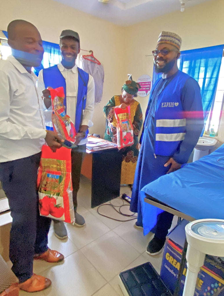 Abuja, Nigeria - Participating in Pediatric Medical Outreach Program by Distributing Essential Pediatric Consumable Supplies, Anti-Malaria Vials & Test Kits to Less Privileged Children & Nursing Mothers and Rice Bags to Volunteers at Local Health Center