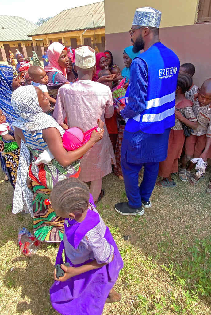 Abuja, Nigeria - Participating in Pediatric Medical Outreach Program & Mobile Food Rescue Program by Distributing Essential Pediatric Consumable Supplies & Anti-Malaria Supplies with Rice Bags, Footwears & Candies to Less Privileged Children & Adults