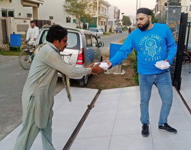 Lahore, Pakistan - Participating in Mobile Food Rescue Program by Preparing, Packaging & Distributing Hot Meals (Chicken Biryani) to 150+ Less Privileged Children & Adults