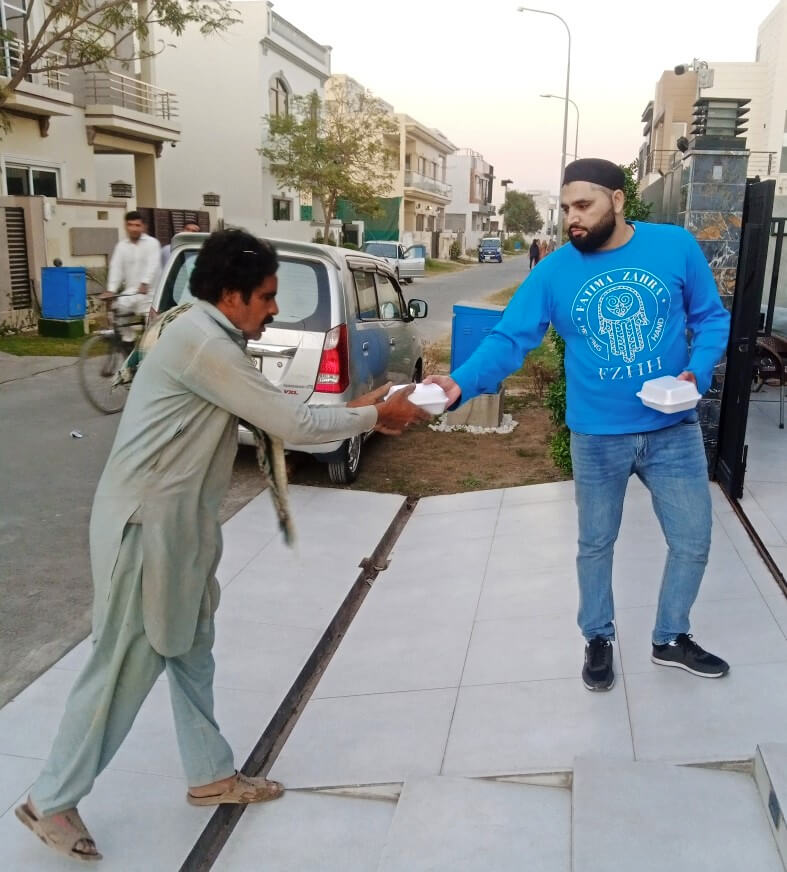 Lahore, Pakistan - Participating in Mobile Food Rescue Program by Preparing, Packaging & Distributing Hot Meals (Chicken Biryani) to 150+ Less Privileged Children & Adults