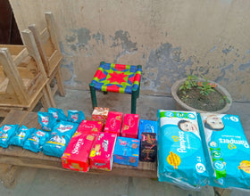 Lahore, Pakistan - Participating in Orphan Support Program & Mobile Food Rescue Program by Distributing Essential Pediatric Consumable Supplies, Snacks & Candies to Local Community's Orphanage Serving Blind Children