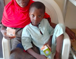 Abuja, Nigeria - Participating in Pediatric Medical Outreach Program & Mobile Food Rescue Program by Distributing Essential Pediatric Consumable Supplies & Administering Anti-Malaria Medications to Less Privileged Children at Local Health Center