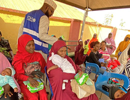 Abuja, Nigeria - Participating in Pediatric Medical Outreach Program & Mobile Food Rescue Program by Distributing Diapers, Medications for Anti-Malaria & Typhoid and Administration Supplies to 40+ Babies & Nursing Mothers at Local Health Center