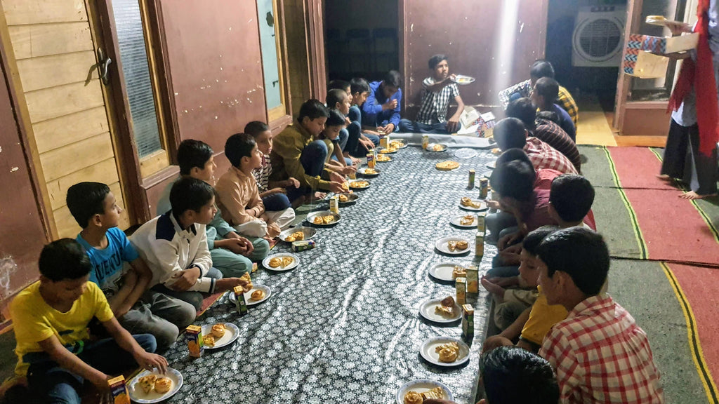 Lahore, Pakistan - Honoring URS/Union of Sayyidina Imam Hasan al-Mujtaba ع (2nd Holy Imam & Beloved Grandson of Prophet Muhammad ﷺ) & Welcoming of the Holy Month of Rabi’ul Awwal by Serving Pizza, Bakery Snacks & Drinks to Beloved Orphans at 2 Orphanages