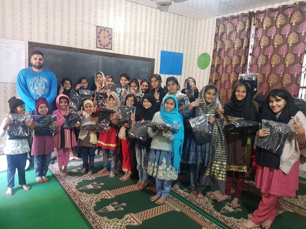 Lahore, Pakistan - Participating in Orphan Support Program by Distributing Brand New Winter School Jerseys to Beloved Orphans at Local Community's All Girls Orphanage