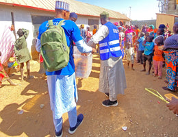 Abuja, Nigeria - Participating in Holy Qurbani Program & Mobile Food Rescue Program by Processing, Packaging & Distributing Holy Qurbani Meat from 4+ Holy Qurbans to 111+ Adults & Distributing Rice Bags, Footwear & Lots of Candies to Children