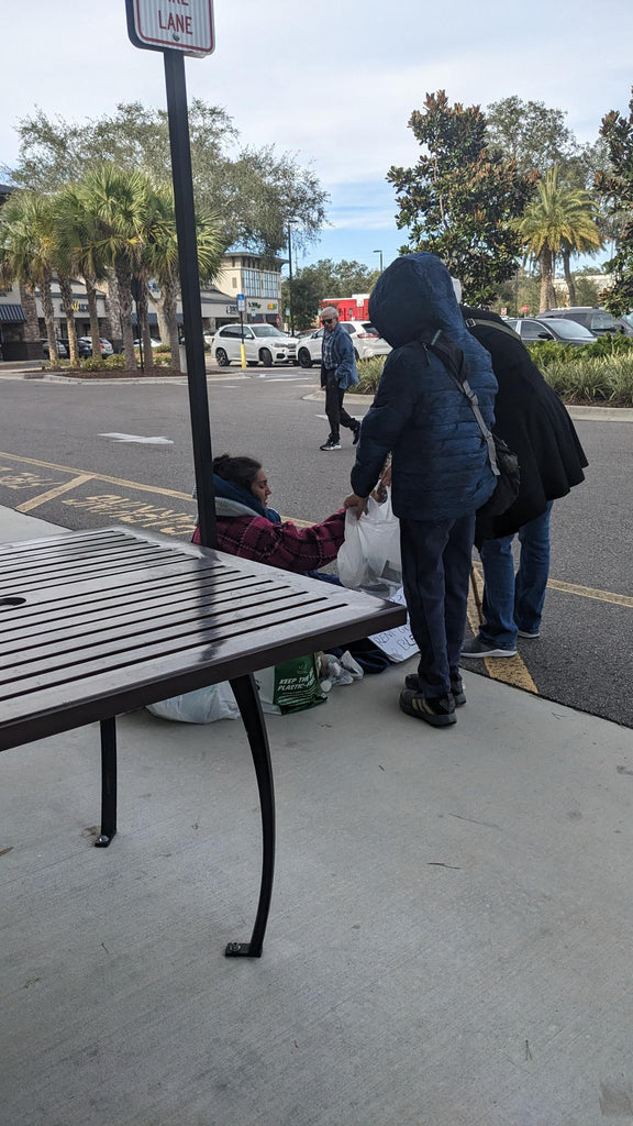 Orlando, Florida - Participating in Mobile Food Rescue Program by Distributing Hot Meals & Bakery Desserts to Local Community's Homeless & Less Privileged People