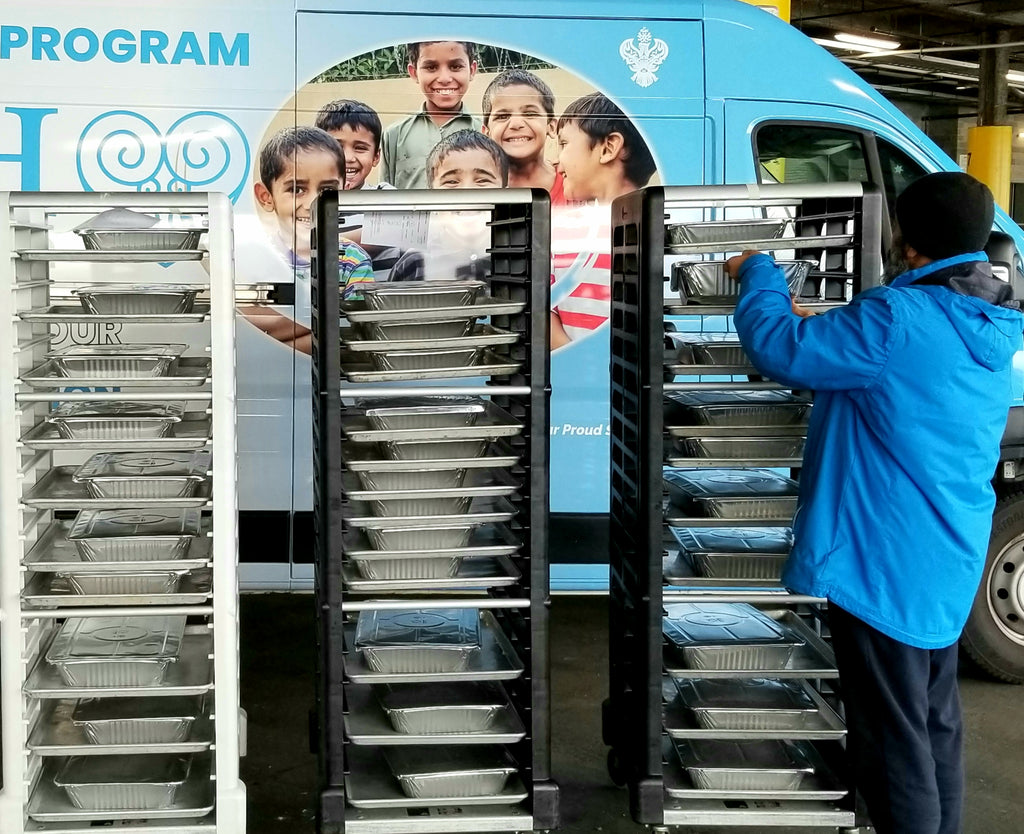 Vancouver, Canada - Participating in Mobile Food Rescue Program by Distributing 100+ Hot Lunches to Local Community's Volunteers Supporting Turkiye's Relief Efforts by Packaging Essential Items