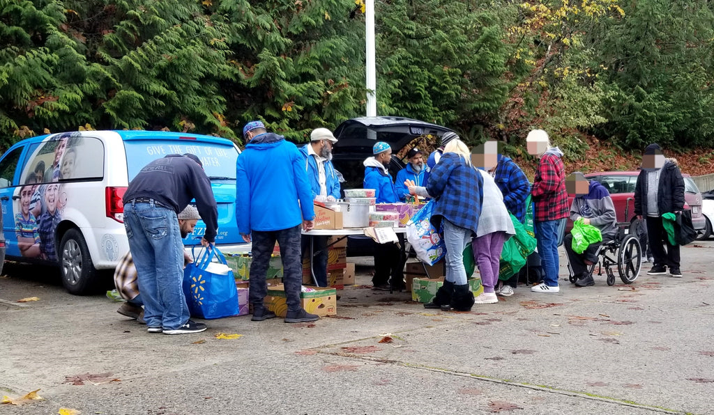 Vancouver, Canada - Participating in Mobile Food Rescue Program by Serving Hot Meals with Drinks & Desserts & Distributing Rescued Fresh Meats, Fresh Produce & Essential Groceries to Local Community's Less Privileged Families