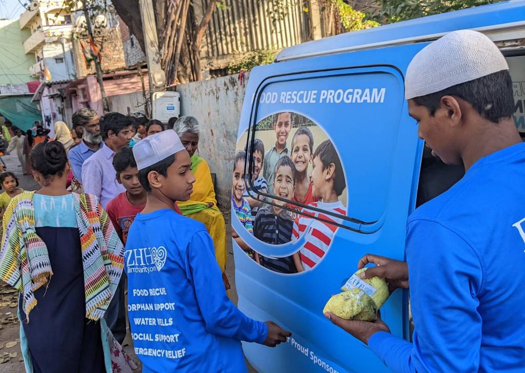 Hyderabad, India - Participating in Mobile Food Rescue Program by Cooking, Packing & Distributing Hot Meals to Local Community's Less Privileged Children & Homeless Families