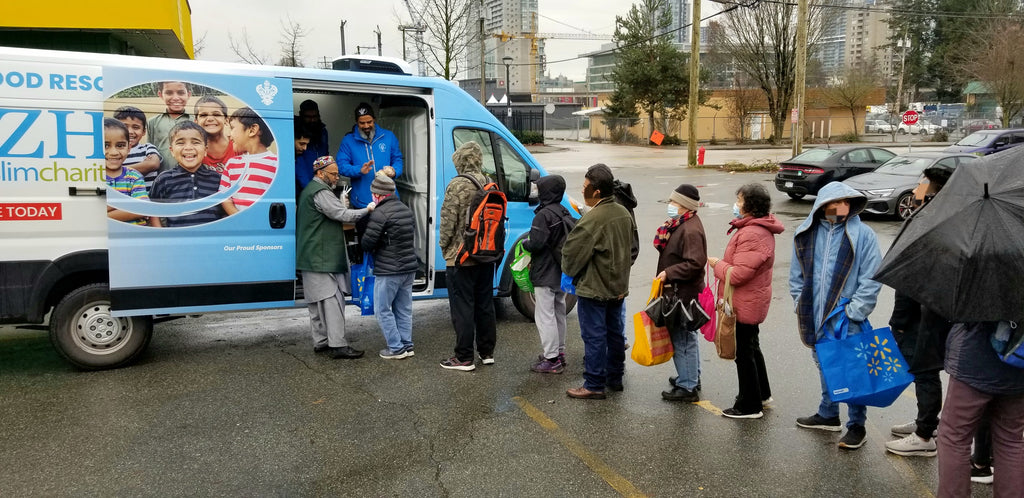 Vancouver, Canada - Participating in Mobile Food Rescue Program by Distributing Hot Meals, Sandwiches & Sweets to Local Community's Homeless & Less Privileged People