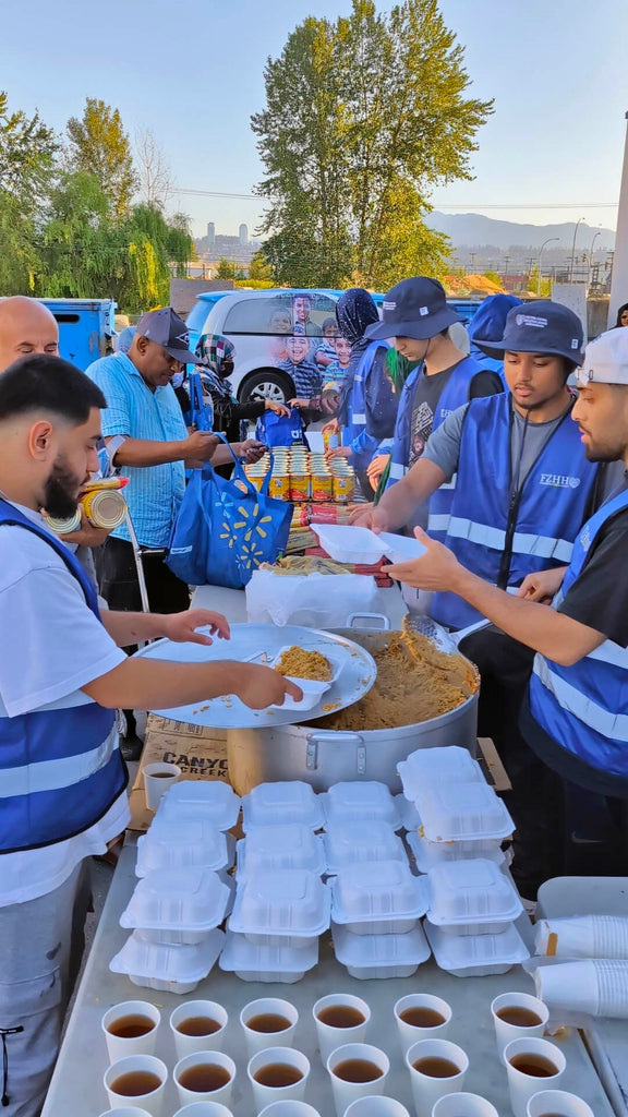 Vancouver, Canada - Participating in Mobile Food Rescue Program by Serving Hot Meals with Cold Drinks & Distributing Essential Groceries & Essential Supplies to Less Privileged Families at Local Community's Muslim Food Bank