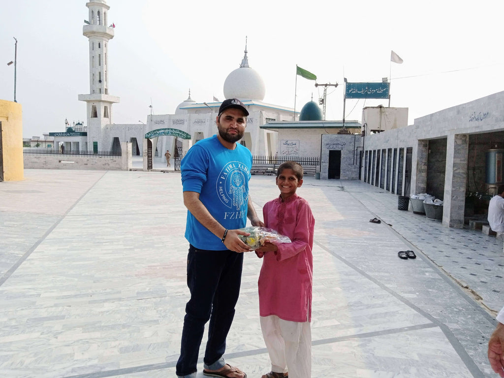 Pakistan - Honoring Shahadat/Witnessing of Imam Muhammad al-Baqir ع on Holy Seventh Day of Dhul Hijjah by Distributing Goodie Bags at Holy Shrines